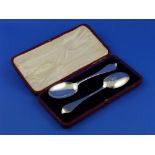 A cased pair of Edwardian silver Table Spoons, by Thomas Bradbury & Sons, hallmarked Sheffield,