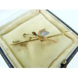 An attractive 15ct yellow gold Bar Brooch, set with a tri-colour gold and enamel flying pheasant.