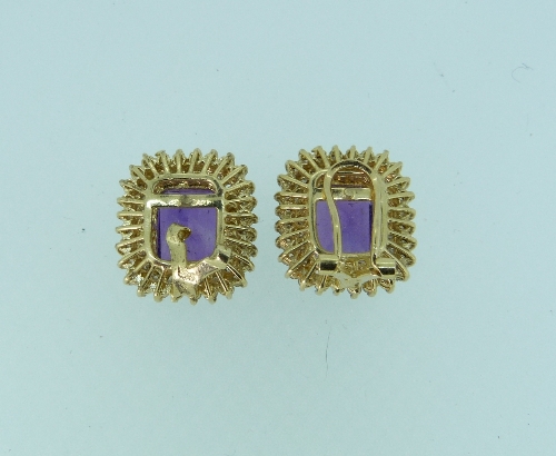 A pair of amethyst and diamond Ear Clips, of rectangular form, the facetted central stone surrounded