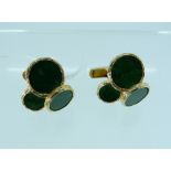 A pair of 14k yellow gold Cufflinks, formed of three graduated textured gold circles, each set
