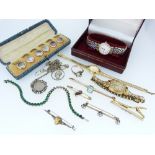 A small collection of Jewellery, including an 18ct yellow gold Bar Brooch, set with three white