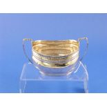 A George III silver two handled Sugar Bowl, hallmarked London, 1805, of ovoid form reeded edge and a