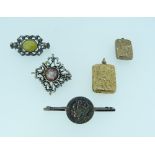 Two Lockets; one in 9ct yellow gold of rectangular form, approx weight 5g, foliate engraved back and