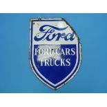 An early 20thC Ford `Ford Cars and Trucks` shield shaped double sided hanging Enamel Sign, one