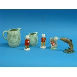 A Beswick pottery Trout, MN.1390, brown and green, and two Beswick pottery Rupert and his Friends