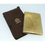 A 9ct yellow gold Cigarette Case, of hinged rectangular form, the front and reverse with engine