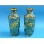 A pair of oriental Cloisonné Vases, blue ground with floral decoration, some restoration to