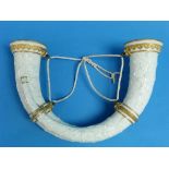 A Royal Worcester white porcelain Wall Vase, modelled as two ornate horns, moulded in relief and