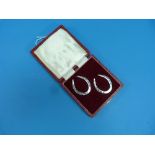 A pair of novelty silver Horseshoe shaped Napkin Rings, by Francis Howard Ltd, hallmarked