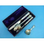 A silver Caddy Spoon, by Francis Howard, hallmarked Sheffield, 1970, together with a matched case