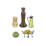 A COLLECTION OF EARLY 20th CENTURY IRIDESCENT GLASS, consisting of a purple vase, a pale green vase,