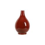 A Chinese Oxblood glazed porcelain vase, of baluster form, 28cm high (damaged)