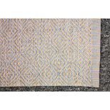 A modern Kathall Hagga style goose eye rug, designed by Gunilla Lagerhern Ullberg, 100% wool, in