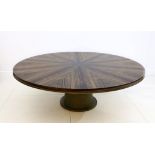 A large Finchatton circular dining table with radiating veneered top on drum base, 220cm diameter.