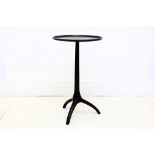 A small Finchatton metal bronzed occasional table with dished top, 36cm diameter.