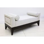 A Brabbu twin end grey upholstered end of bed bench, on ebonised base, 138 x 55cm.