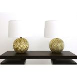 A pair of ceramic polka dot table lamps and shades, 54cm high. shades by Arteriors.