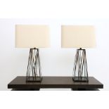 A pair of  supplied brass effect and glass table lamps, with square shades by Arteriors.