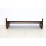 A Finchatton pool bench, with white towelling upholstery, 140cm long x 43cm wide.