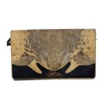 AN UNUSUAL JAPANESE TOAD SKIN HANDBAG. 20th Century. A black leather clutch bag decorated with a