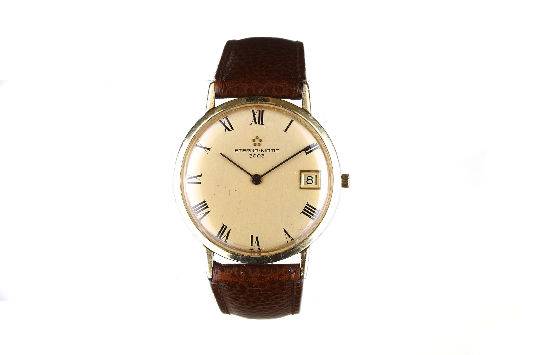 Eternamatic 3003. An 18K gold automatic calendar wristwatch. Model: 3003. Case reference: 744. Date: