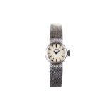 Tissot. A 9K white gold manual wind bracelet watch. Date: Circa 1980. Movement: Signed, cal.2403.