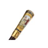 A late 19th century Continental porcelain cane handle, probably French Decorated with a courting