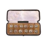 A cased set of twelve Victorian antique sterling silver buttons, Birmingham 1900, by Levi &