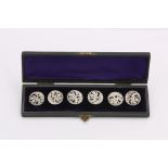A cased set of six late Victorian antique sterling silver buttons putti motifs 1900-1901, by Nathan
