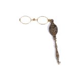 A late 19th/early 20th century French Art Nouveau silver lorgnette the handle decorated with flowers