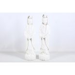 A pair of Chinese Blanc de Chine porcelain figures of Guanyin, 19th Century, 43cm high (one damaged)