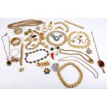 A collection of costume jewellery, mid-20th Century and later, to include gold plated bracelets,