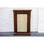 A small Regency rosewood chiffonier, circa 1820, the silk lined brass grille door with gilt metal
