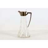 An Edwardian silver-mounted glass claret jug, early 20th Century, the mounts by Hutton and Sons,