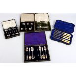 A cased set of six Edwardian sterling silver dessert knives with bone handles, early 20th Century;