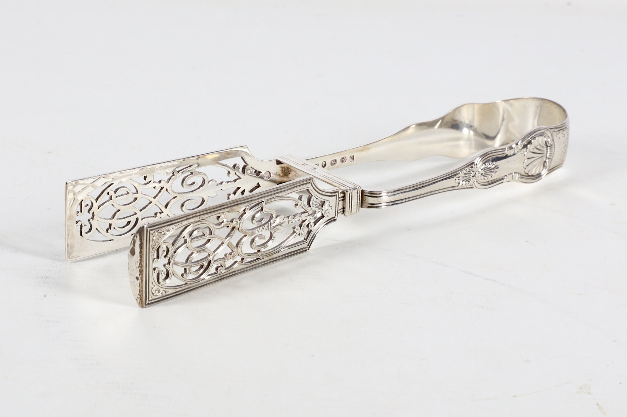 A pair of Victorian sterling silver King's pattern asparagus tongs, 19th Century, by John Gilbert