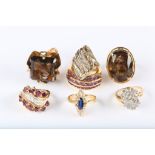 A collection of dress rings, Including smoky quartz, a sapphire and diamond cluster ring, an