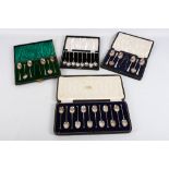 A cased set of twelve sterling silver teaspoons in Arts & Crafts style, hallmarked for Sheffield