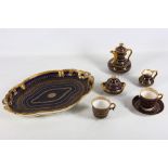 A Copeland porcelain jewelled cabaret set, late 19th century, elaborately decorated with gilding and