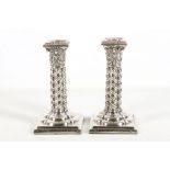 A good pair of late Victorian Sheffield silver plated candlesticks, late 19th Century, in the manner