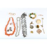 A collection of jewellery, Including a paste riviere, a shell cameo, a coral necklace, a harp charm,