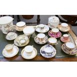 A large collection of porcelain cups and saucers, mostly 19th Century, to include a Derby coffee can