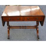 A Regency-style mahogany sofa table, mid-20th century, with a rectangular twin-flap top over two