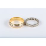 A diamond eternity ring, in an engraved mount, stamped plat; and an 18ct gold bi-coloured band ring,