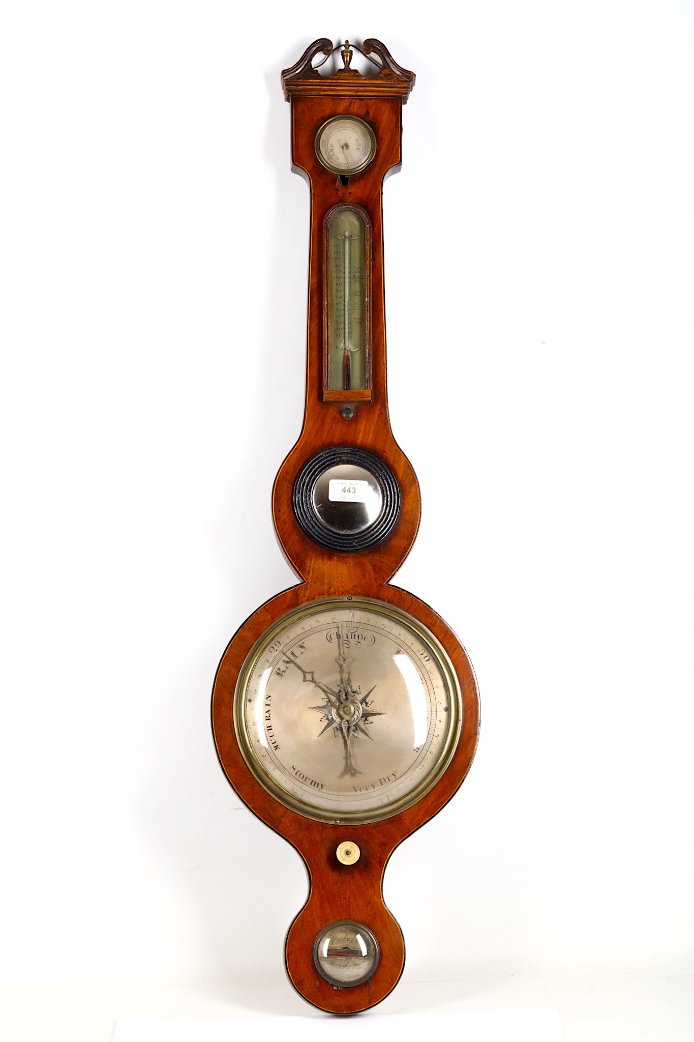 A Georgian mahogany wheel barometer, early 19th Century, with hygrometer and engraved brass