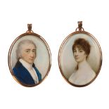 CHARLES ROBERTSON (BRITISH c.1760-1821) A fine pair of portrait miniatures of a husband and wife,