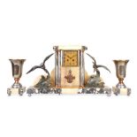 AN ART DECO PERIOD BRONZED SPELTER AND MARBLE CLOCK GARNITURE the clock case with a marble plinth