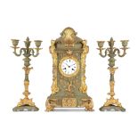 A LATE 19TH CENTURY PAINTED AND GILT METAL CLOCK GARNITURE in the Renaissance Revival style, the