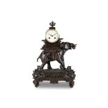 A LATE 19TH CENTURY FRENCH BRONZED SPELTER CLOCK MODELLED WITH AN ELEPHANT the walking beast with