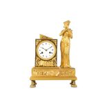 AN EARLY 19TH CENTURY FRENCH EMPIRE GILT BRONZE FIGURAL MANTEL CLOCK OF MUSICAL THEME depicting a